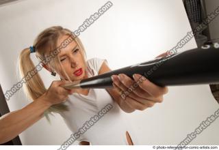 19 2018 01 NIKOL HARLEY STANDING POSE WITH BASEBALL BAT